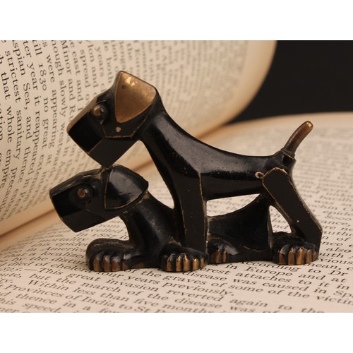 3261 - An Art Deco dark patinated bronze pair of stylised terriers, marked 