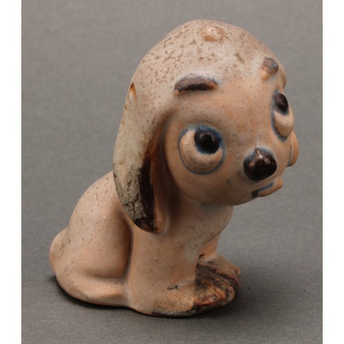 3098 - An unusual set of four Bourne Denby stoneware Fido dog graduated models, the tallest 15cm, the small... 