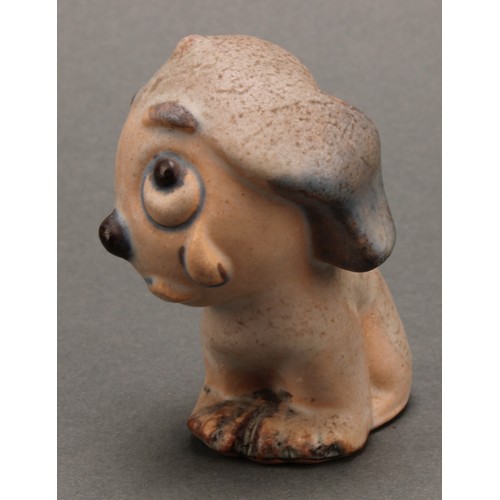 3098 - An unusual set of four Bourne Denby stoneware Fido dog graduated models, the tallest 15cm, the small... 