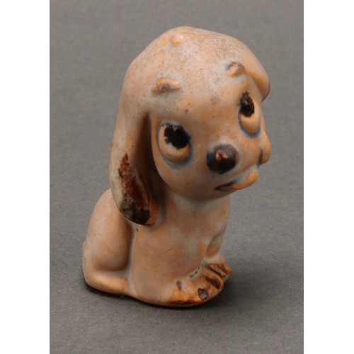 3098 - An unusual set of four Bourne Denby stoneware Fido dog graduated models, the tallest 15cm, the small... 