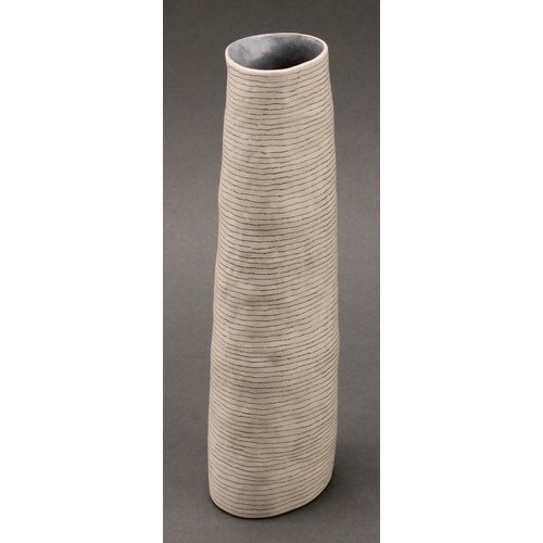 3215 - Susan Disley, a tall studio pottery slightly tapering cylindrical vase, 23cm high; a conforming cup,... 