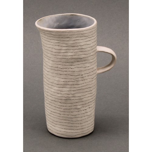 3215 - Susan Disley, a tall studio pottery slightly tapering cylindrical vase, 23cm high; a conforming cup,... 