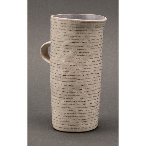 3215 - Susan Disley, a tall studio pottery slightly tapering cylindrical vase, 23cm high; a conforming cup,... 