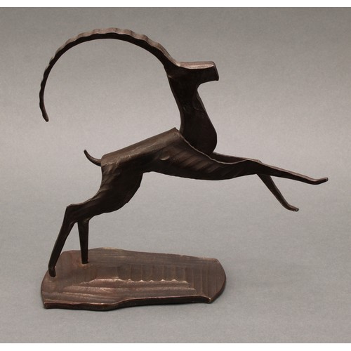 3265 - An Austrian dark patinated bronze and steel sculpture, stylised angular leaping Ibex, label to base,... 