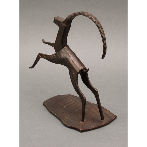 3265 - An Austrian dark patinated bronze and steel sculpture, stylised angular leaping Ibex, label to base,... 