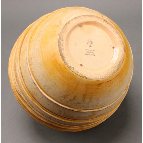 3095 - A Bourne Denby ribbed globular vase, by Alice Teichner, glazed in tones of yellow, printed marks, 20... 