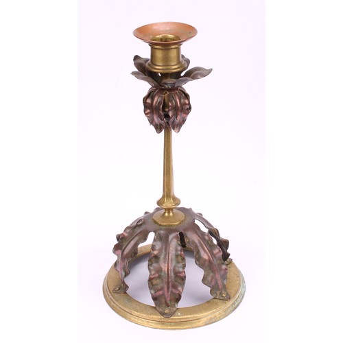 3251 - A pair of Arts and Crafts copper and brass candlesticks, in the manner of W A S Benson, each drip pa... 