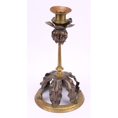 3251 - A pair of Arts and Crafts copper and brass candlesticks, in the manner of W A S Benson, each drip pa... 