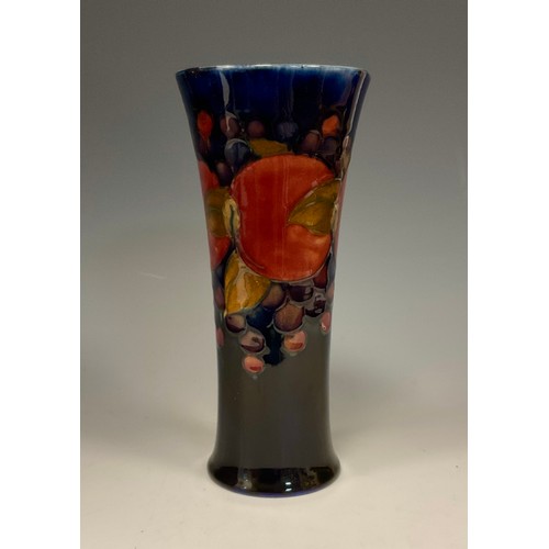 3128 - A Moorcroft Pomegranate pattern tulip vase, impressed Moorcroft marks, 8.5cm high, c.1916-18