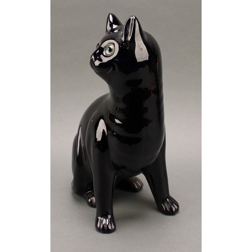 3068 - A Bretby model of a deep blue cat, green glass eyes, 35.5cm, number 2405H, impressed sunburst mark, ... 