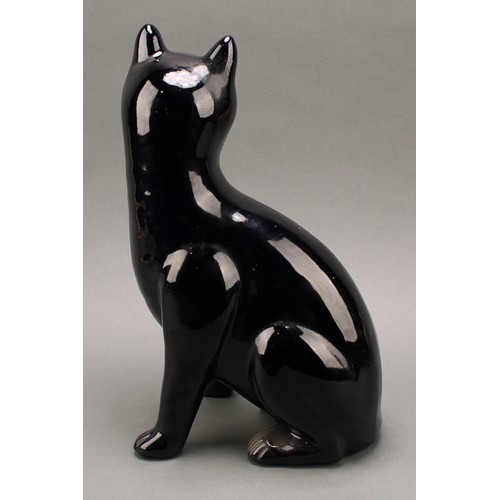 3068 - A Bretby model of a deep blue cat, green glass eyes, 35.5cm, number 2405H, impressed sunburst mark, ... 