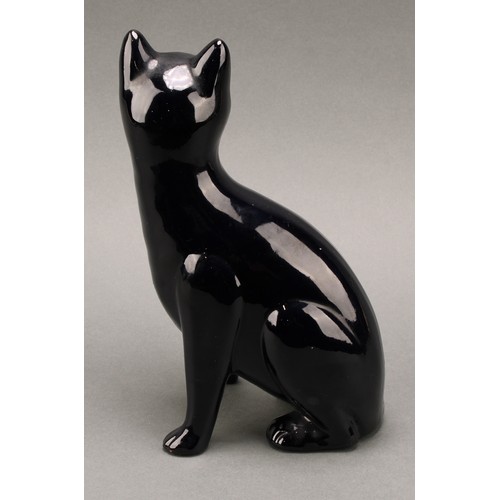 3068 - A Bretby model of a deep blue cat, green glass eyes, 35.5cm, number 2405H, impressed sunburst mark, ... 