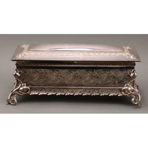 3282 - A WMF Art Nouveau plated sarcophagus table casket, embossed in relief with dragonflies, the angle br... 