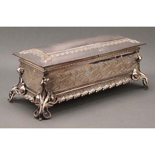 3282 - A WMF Art Nouveau plated sarcophagus table casket, embossed in relief with dragonflies, the angle br... 