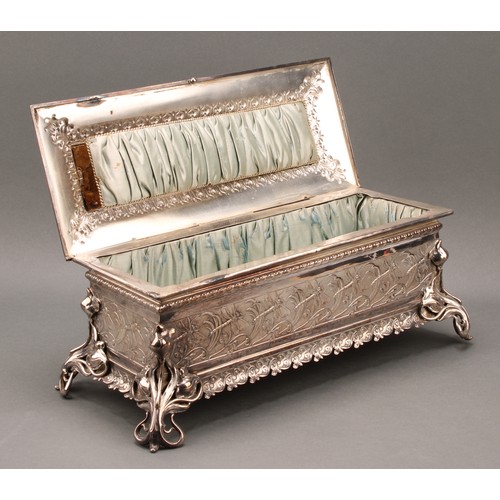 3282 - A WMF Art Nouveau plated sarcophagus table casket, embossed in relief with dragonflies, the angle br... 