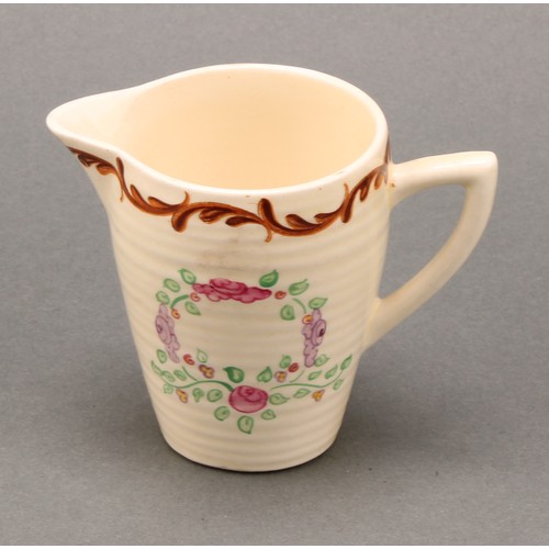 3004 - A Clarice Cliff coffee set, painted with floral garlands on a honey glaze ground, comprising ribbed ... 