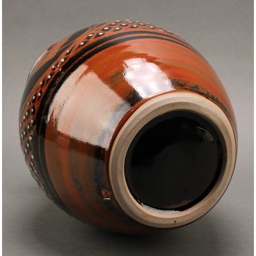 3212 - Studio Pottery - Derek Emms (1929-2004), a tenmoku and kaki glaze ovoid vase, decorated with stylise... 