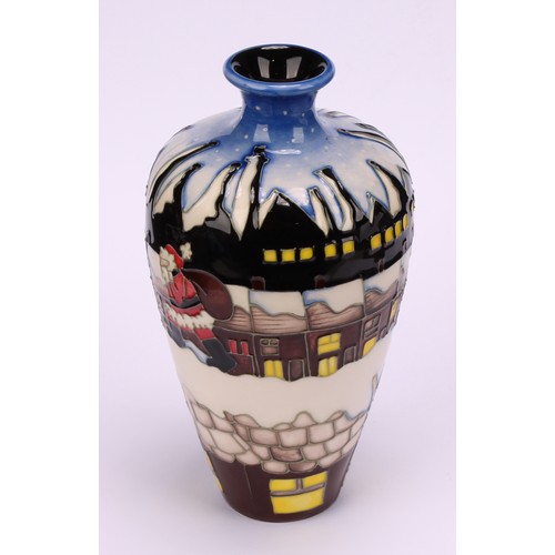 3112 - A Moorcroft baluster vase decorated with Santa in terraced street in the potteries, impressed and mo... 