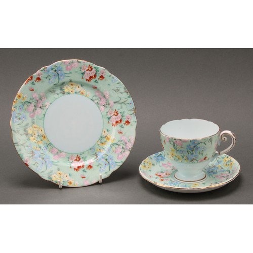 3155 - A Shelley Melody pattern part dinner and tea set, printed with chintz blossom, printed marks; qty