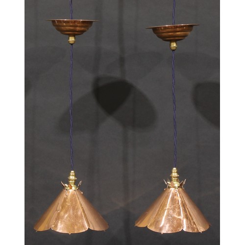 3421 - A pair of Arts & Crafts style copper conical flowerhead shaped ceiling pendants, in the manner of W.... 