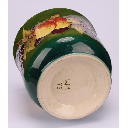 3116 - A Moorcroft Fruit and Vine pattern jardiniere, 17cm high, impressed and painted marks; a Moorcroft H... 