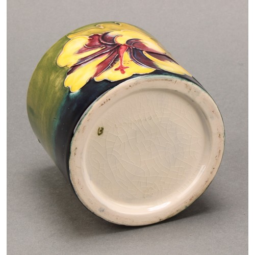 3120 - A Moorcroft Hibiscus pattern ovoid bottle vase, 21.5cm high, monogrammed, impressed mark; another, s... 