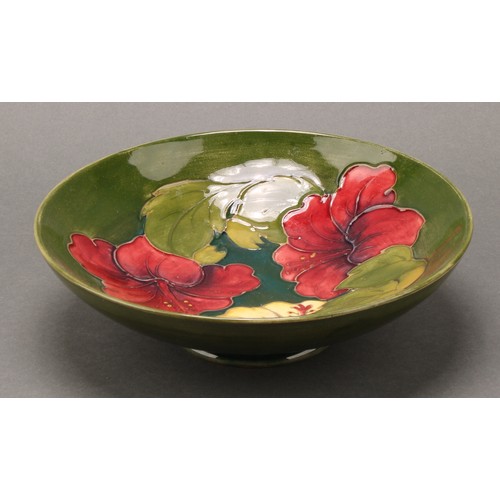 3118 - A Moorcroft Hibiscus pattern bowl, 26cm diameter, monogrammed, impressed mark; another, smaller, 18.... 