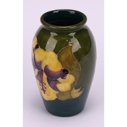 3122 - A Moorcroft Hibiscus pattern ovoid vase, 18.5cm high, monogrammed, impressed mark, late Queen Mary p... 