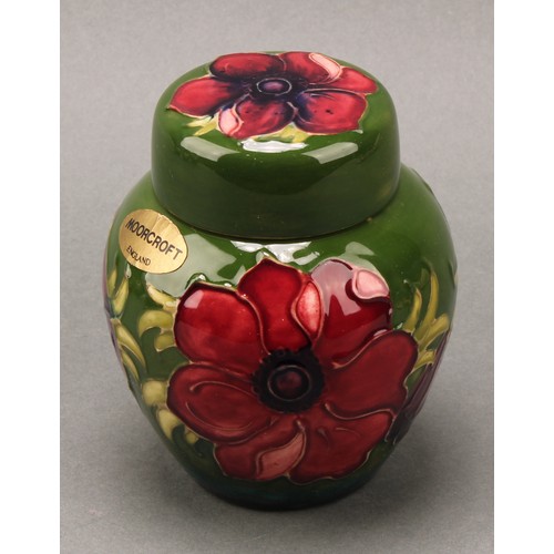 3111 - A Moorcroft Anemone pattern ginger jar and cover, 10.5cm high, impressed mark, boxed; an associated ... 