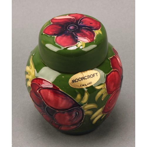 3111 - A Moorcroft Anemone pattern ginger jar and cover, 10.5cm high, impressed mark, boxed; an associated ... 