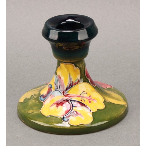 3111 - A Moorcroft Anemone pattern ginger jar and cover, 10.5cm high, impressed mark, boxed; an associated ... 