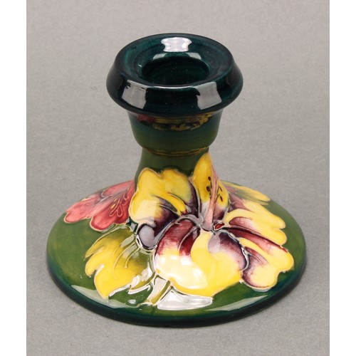 3111 - A Moorcroft Anemone pattern ginger jar and cover, 10.5cm high, impressed mark, boxed; an associated ... 