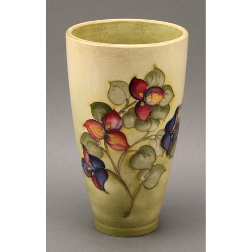 3117 - A Moorcroft Hibiscus pattern boat shaped vase, 16.5cm wide, impressed mark, late Queen Mary paper la... 