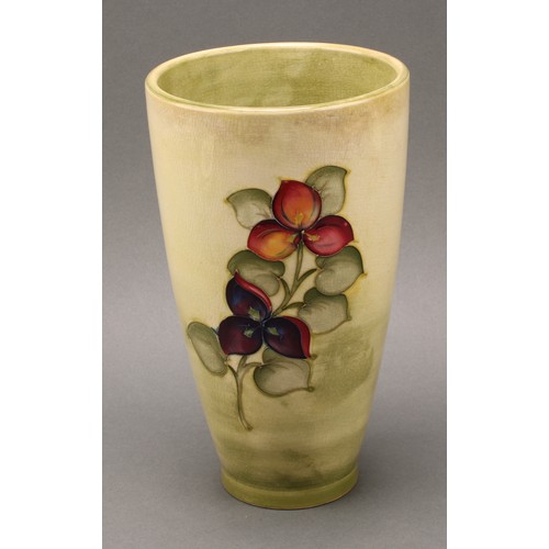 3117 - A Moorcroft Hibiscus pattern boat shaped vase, 16.5cm wide, impressed mark, late Queen Mary paper la... 