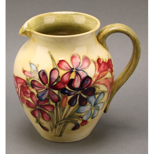 3117 - A Moorcroft Hibiscus pattern boat shaped vase, 16.5cm wide, impressed mark, late Queen Mary paper la... 