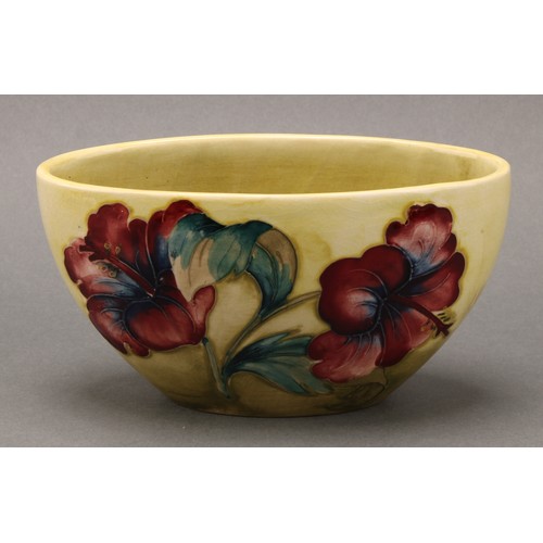 3117 - A Moorcroft Hibiscus pattern boat shaped vase, 16.5cm wide, impressed mark, late Queen Mary paper la... 