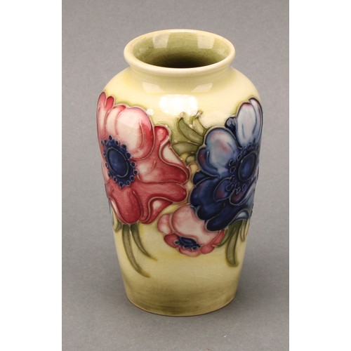 3117 - A Moorcroft Hibiscus pattern boat shaped vase, 16.5cm wide, impressed mark, late Queen Mary paper la... 