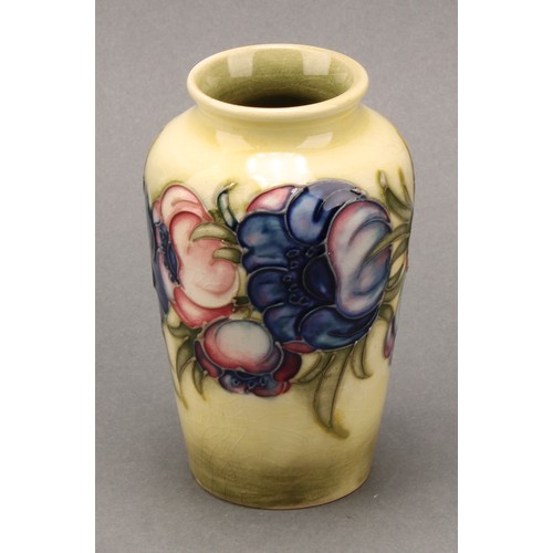 3117 - A Moorcroft Hibiscus pattern boat shaped vase, 16.5cm wide, impressed mark, late Queen Mary paper la... 