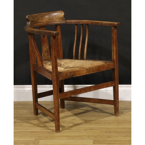 3411 - An Arts & Crafts oak elbow chair, possibly Glasgow School, in the manner of E.A. Taylor and Wylie & ... 