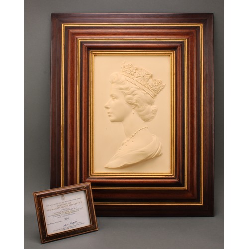 3073 - A large framed Royal Worcester cameo portrait plaque of Her Majesty Queen Elizabeth II, modelled by ... 