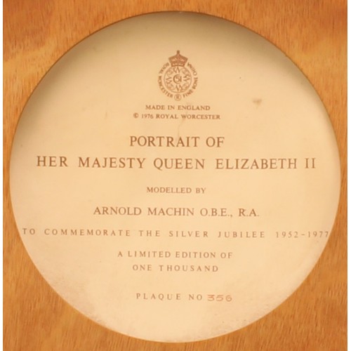 3073 - A large framed Royal Worcester cameo portrait plaque of Her Majesty Queen Elizabeth II, modelled by ... 