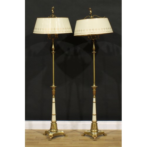 3425 - Interior Design - a pair of Neoclassical design brass and tole floor lamps, the base weight impresse... 