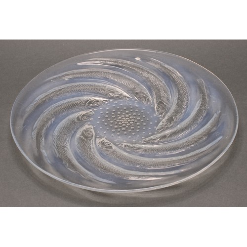 3244 - A Lalique Poisson pattern opalescent circular dish or plate, reverse moulded with a swirl of stylise... 