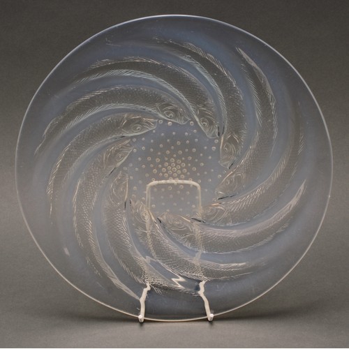 3244 - A Lalique Poisson pattern opalescent circular dish or plate, reverse moulded with a swirl of stylise... 