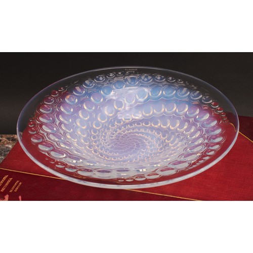 3243 - A Lalique Volutes pattern opalescent glass circular shallow bowl, reverse moulded with a swirl of se... 