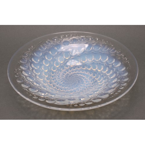 3243 - A Lalique Volutes pattern opalescent glass circular shallow bowl, reverse moulded with a swirl of se... 