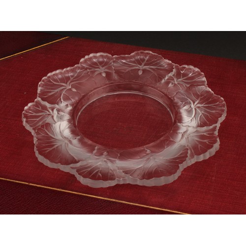 3241 - A Lalique Honfleur frosted glass shaped circular dish, the border moulded with leaves, 15cm diameter... 