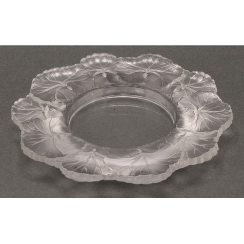 3241 - A Lalique Honfleur frosted glass shaped circular dish, the border moulded with leaves, 15cm diameter... 