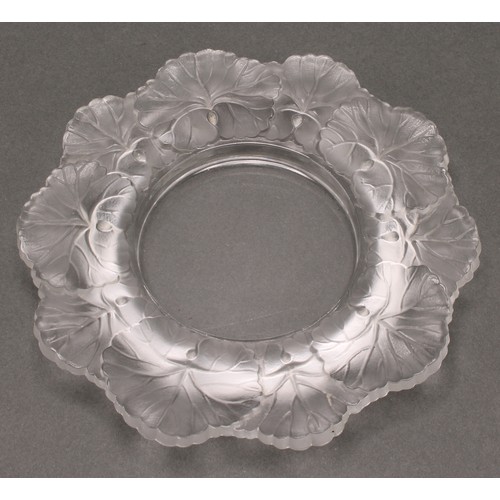 3241 - A Lalique Honfleur frosted glass shaped circular dish, the border moulded with leaves, 15cm diameter... 