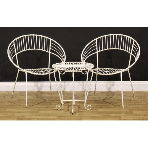 3361 - A wirework three-piece garden suite, comprising a pair of satellite shaped chairs and occasional tab... 